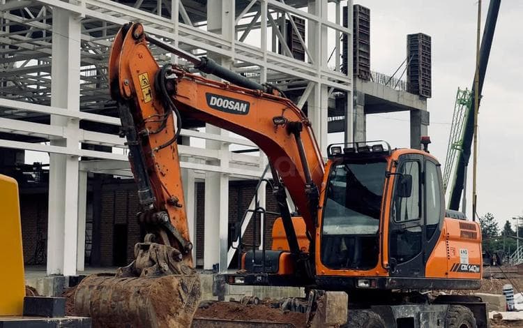 Doosan DX140W