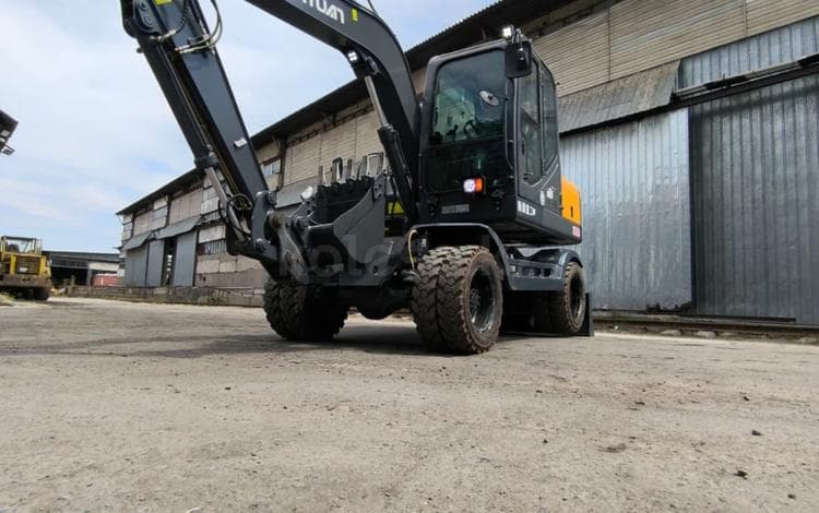 Xinyuan XYB65ECOT Экскаватор колесный